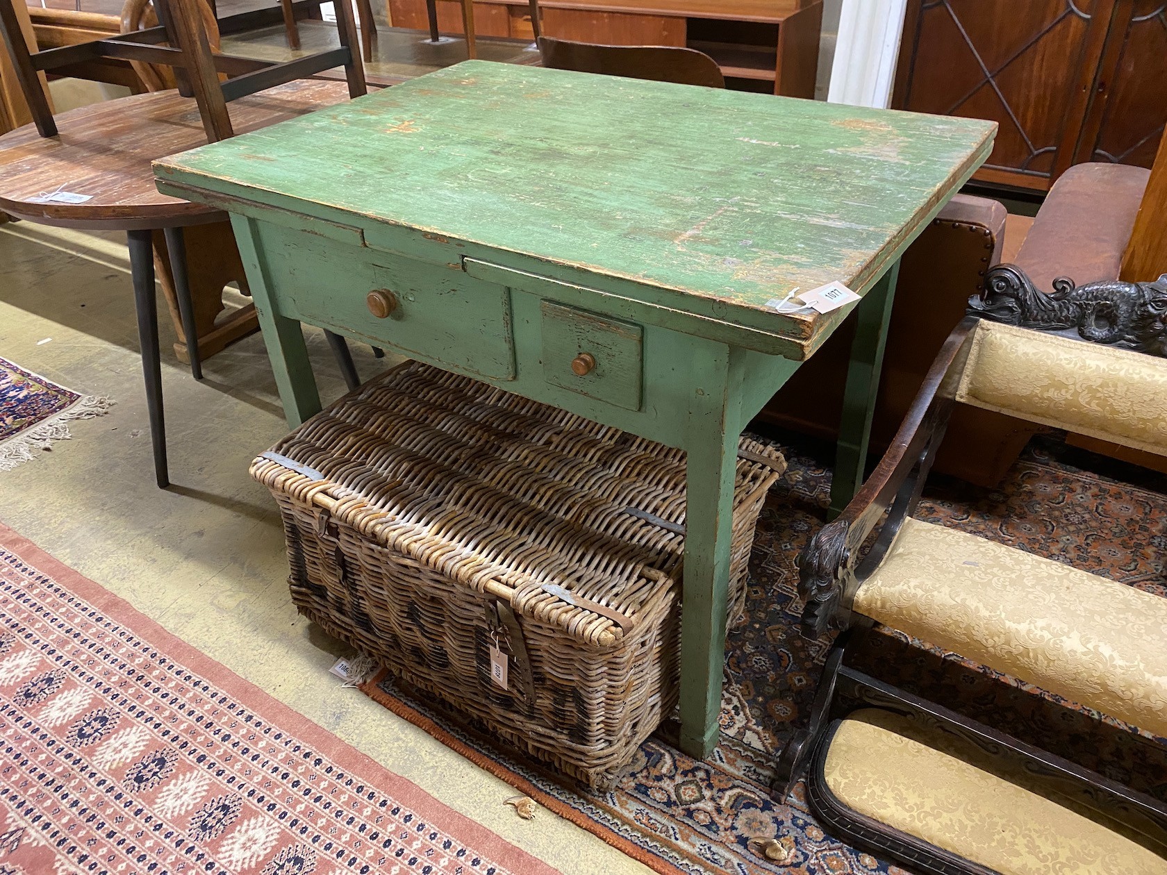 A late 19th century Continental two drawer painted draw leaf dining table, length 110cm, depth 80cm, height 84cm